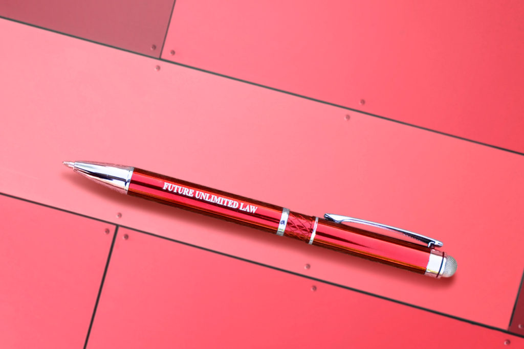 Red Farella Stylus pen on a red metal background
